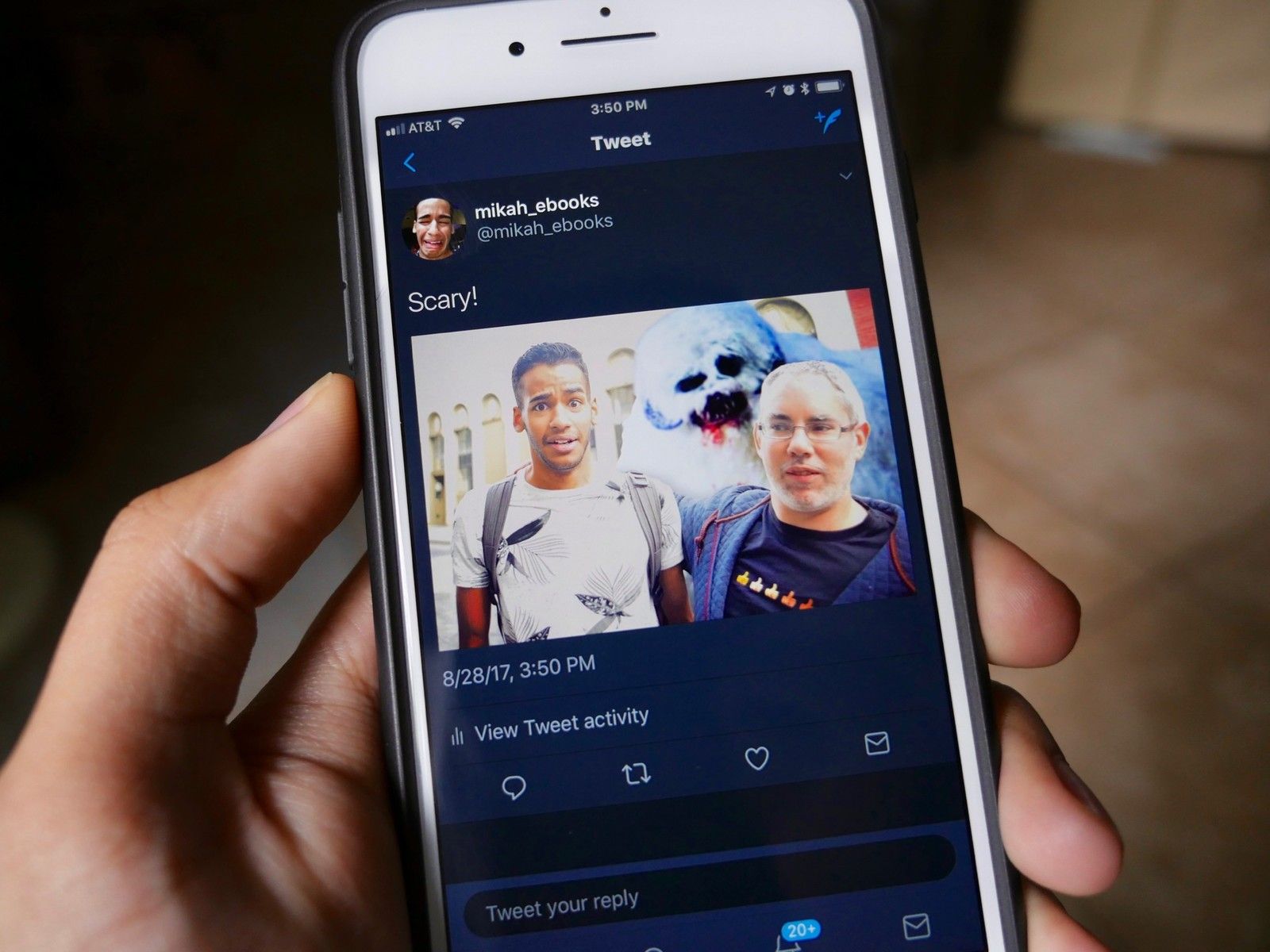 На фотографии показан iPhone с открытым приложением Twitter. Пост в твиттере гласит"scary!" The image shows Rene Ritchie and Mikah Sargent standing beside one another. A fictional Star Wars monster, the wampa, stands behind them. The photo is terribly composited.