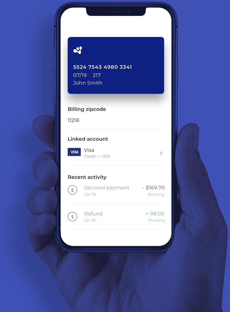 Рука держит iPhone с приложением Token